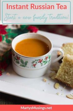 a cup of tea next to a piece of cake on a plate with the words instant russian tea