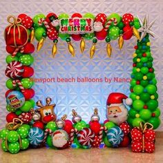 an image of christmas decorations on display in front of a sign that says newport beach balloons by nanna