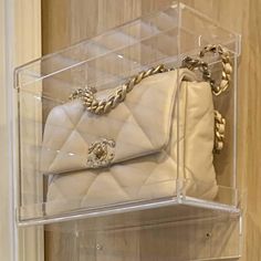 Premium clear acrylic designed to display and store luxury bags on the wall. This optional accessory for the Model C Medium allows one to display Chanel classic flap and other luxury bags on the wall. A beautiful and sturdy shelf, a perfect accessory for a more secure wall display & storage of designer handbags Luxury Bag Display, Designer Handbag Storage, Purse Display, Handbag Care, Bags Inside, Handbag Display, Louis Vuitton Neverfull Pm, Hand Bags For Women, Handbag Storage