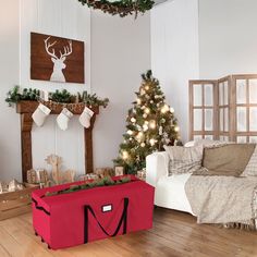 a living room filled with furniture and christmas decorations