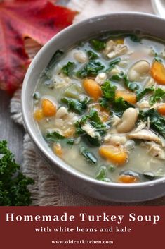 homemade turkey soup with white beans and kale in a bowl on top of a table