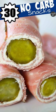 there are three pieces of meat wrapped in ham and green olives with the words 30 no carb snacks on it