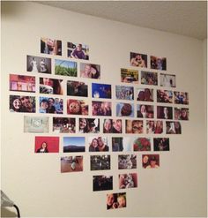 a heart shaped photo collage hanging on the wall