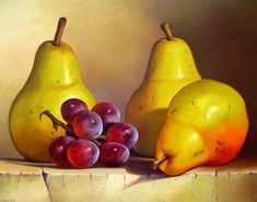 three pears and two grapes on a ledge