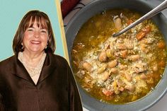 a woman standing next to a bowl of soup and a photo of herself smiling at the camera