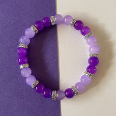 Purple Beaded Bracelets Greatergood, Cheap Purple Beaded Bracelets For Festivals, Affordable Purple Beaded Bracelets, Cheap Purple Beaded Wristband, Cheap Casual Purple Beaded Bracelets, Purple Jewerly Beads, Cheap Purple Friendship Bracelets With Spacer Beads, Cheap Purple Stretch Bracelet With Round Beads, Cheap Personalized Purple Beaded Bracelets