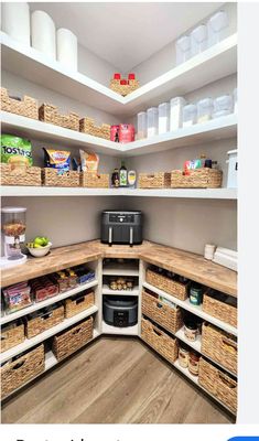 an organized pantry with baskets and food items