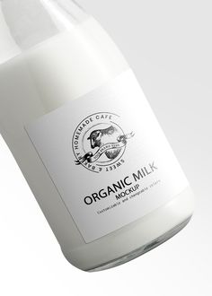 a bottle of organic milk on a white background