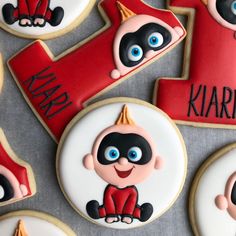 decorated cookies with characters on them are displayed