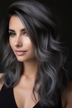 Black hair with a smoky grey balayage gives an edgy modern variation to the original balayage. If you want to portray that sophisticated, urban-chic look, then this is the style to seek after. Click here to check out more gorgeous balayage for dark hair ideas. Black Hair With Charcoal Highlights, Cool Tone Black Hair Color, Smoky Hair Color Grey, Charcoal Highlights On Dark Hair, Dark Hair With Color Highlights, Black Ashy Balayage, Dark Gray Hair Color Ideas, Grey Blending Black Hair, Black Hair With Grey Balayage