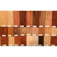 several different types of wood are on display in this photo, with price tags attached to them