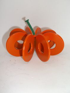 "Who would have thought that cute washers could turn into a pumpkin? This Pumpkin is handcrafted using 8 small recycled 5/8 inch washers, and then painted orange along with a green stem. It makes a wonderful gift or the perfect piece for your home decor. It is a great decoration all year round but, especially for Halloween. SIZE: 4\" Width x 4\" Depth x 3\" Height. Dimensions are approximate and may differ slightly. HANDMADE IN THE USA When looking at the prices of these items please take into c Halloween Welding Art, Fall Metal Art, Washer Crafts, Welded Metal Projects, Welding Crafts, Metal Ideas, Horseshoe Projects, Welding Art Projects, Horseshoe Art