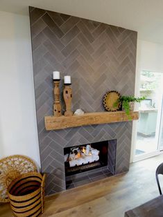 a living room with a fire place and chairs