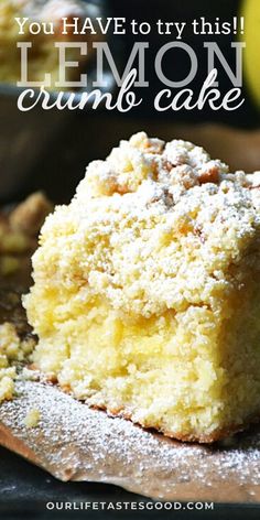 a piece of lemon crumb cake sitting on top of a wooden cutting board