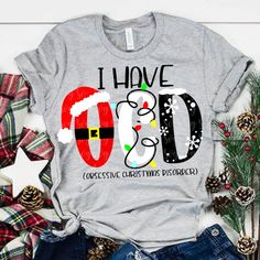 a t - shirt that says i have god on it with santa's hat