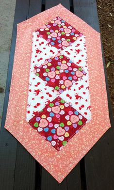 a close up of a piece of fabric on a bench