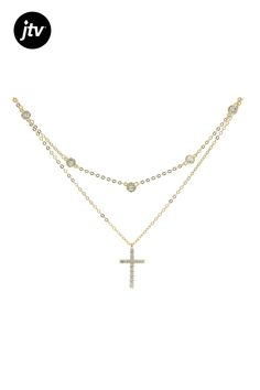 Bella Luce�� white diamond simulant 1.18ctw round, Eterno��� 18k yellow gold over sterling silver cross necklace. Necklace drop measures approximately 0.75" L x 0.46" W. Cable chain measures approximately 18" L x 0.03" W and has a lobster claw clasp closure. The diamond equivalent weight is 0.72ctw. Gold Cross-shaped Cubic Zirconia Diamond Necklace, Silver Cross Necklace, Sterling Silver Cross Necklace, Diamond Simulant, Necklace Necklace, Sterling Silver Cross, Silver Cross, Cable Chain, White Diamond