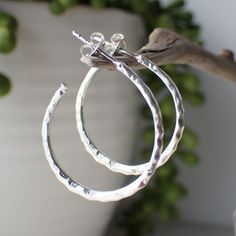 This is a beautiful pair of sterling silver hammered  hoop earrings that have a post with a sterling silver back. They measure 1 inch in diameter and are hammered on both sides. Hammered Silver Jewelry, Moon Phases Necklace, Hammered Hoop Earrings, Hammered Earrings, Hammered Sterling Silver, Disc Earrings, Silver Jewelry Handmade, Hammered Silver, Sterling Silver Hoops