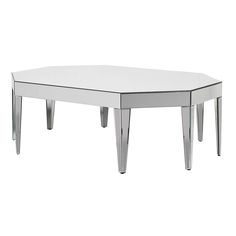 a white table with chrome legs and a mirror top on the bottom, against a white background