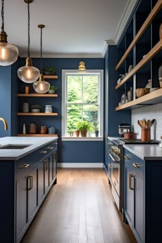 a kitchen with blue walls and wooden floors, white counter tops and open shelving