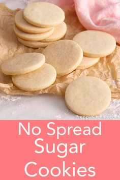 no spread sugar cookies on a plate with pink napkin