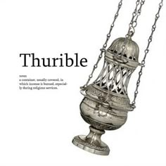 the cover of thurble magazine featuring an ornate silver vase on a chain hanging from it's side