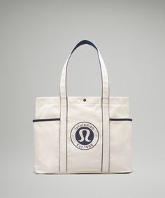 Daily Multi-Pocket Canvas Tote Bag 20L *Logo | Unisex Bags,Purses,Wallets | lululemon Lululemon Bags, Picnic Essentials, Shopping Totes, Custom Bags, Canvas Tote Bag, Beach Bag, Purse Wallet, Canvas Tote, Jogging