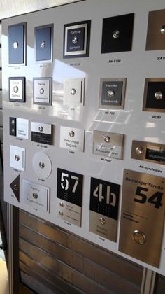 there are many buttons and numbers on the wall