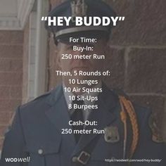 a man in uniform standing next to a brick wall with the words hey buddy on it