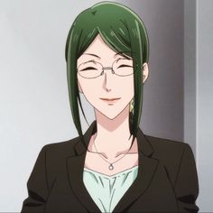 a woman with green hair wearing glasses and a black blazer is looking at the camera