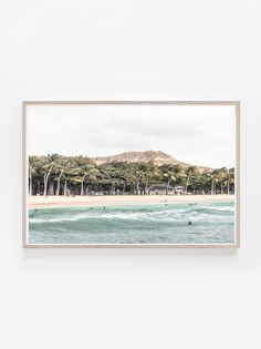 an art print with people swimming in the ocean