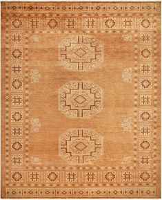 an orange and beige rug with three medallions on the center, two circles in the middle