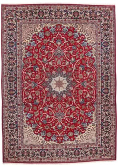 a red and blue rug with an intricate design on the center, surrounded by flowers