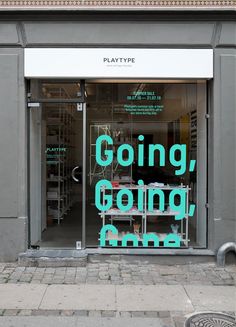 an image of a storefront with the words going going on it