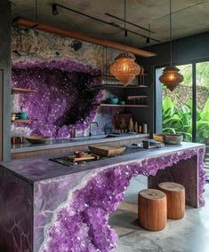 a kitchen with purple stone counter tops and stools in front of an open window