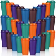 many different colored cups are stacked together