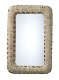 a square mirror made out of wicker