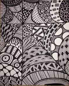 an artistic drawing with black and white colors on paper, depicting different shapes in the form of circles