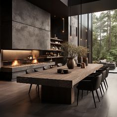 a dining room table surrounded by black chairs and an open fire place in the center