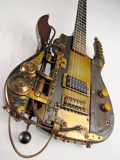 an old guitar made out of mechanical parts