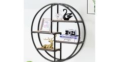 a circular metal shelf with three shelves on each side and an animal figurine in the middle