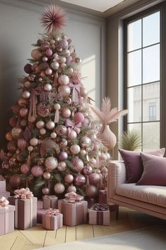 a pink christmas tree with presents under it