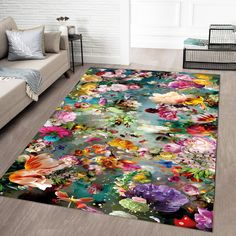 a rug with flowers on it in a living room