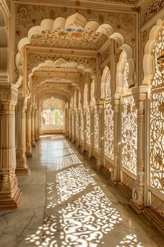 an ornate hallway with columns and arches