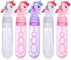 three water bottles with unicorns on them and one has an eight in the bottom