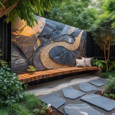 a bench sitting in the middle of a lush green yard with stone walkways and stepping stones