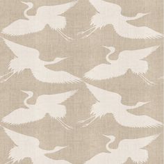 a beige and white wallpaper with birds in flight on it's back side