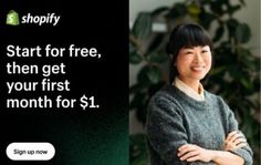 a woman standing in front of a plant with the words shopify written on it