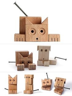 wooden toys made to look like cats and kittens