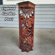 a wooden post with an intricately carved design on the top and bottom, sitting in front of a house